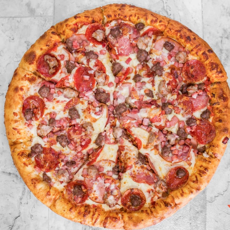 Indulge in Our Meat Lovers Pizza