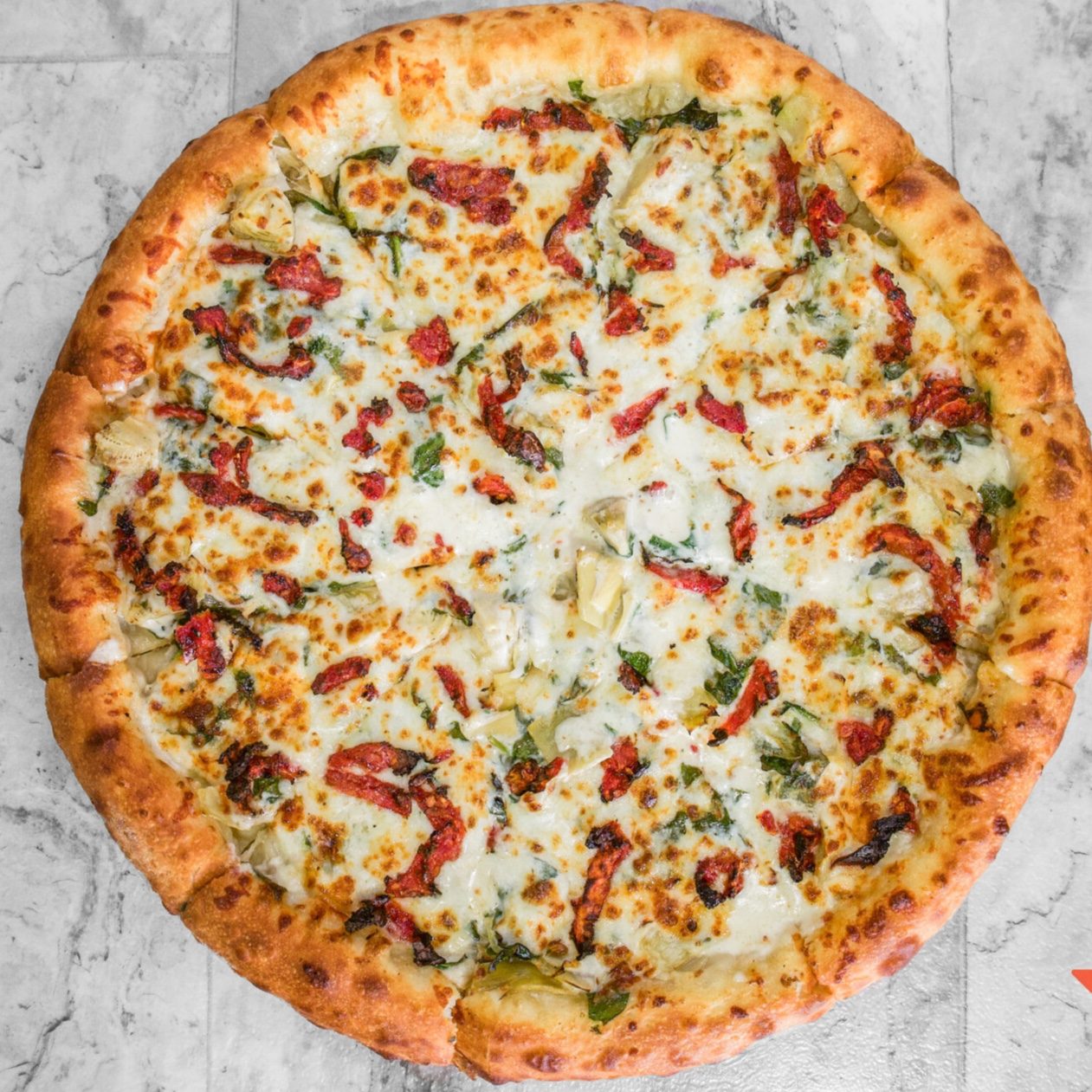 Creamy Artichoke Pizza.