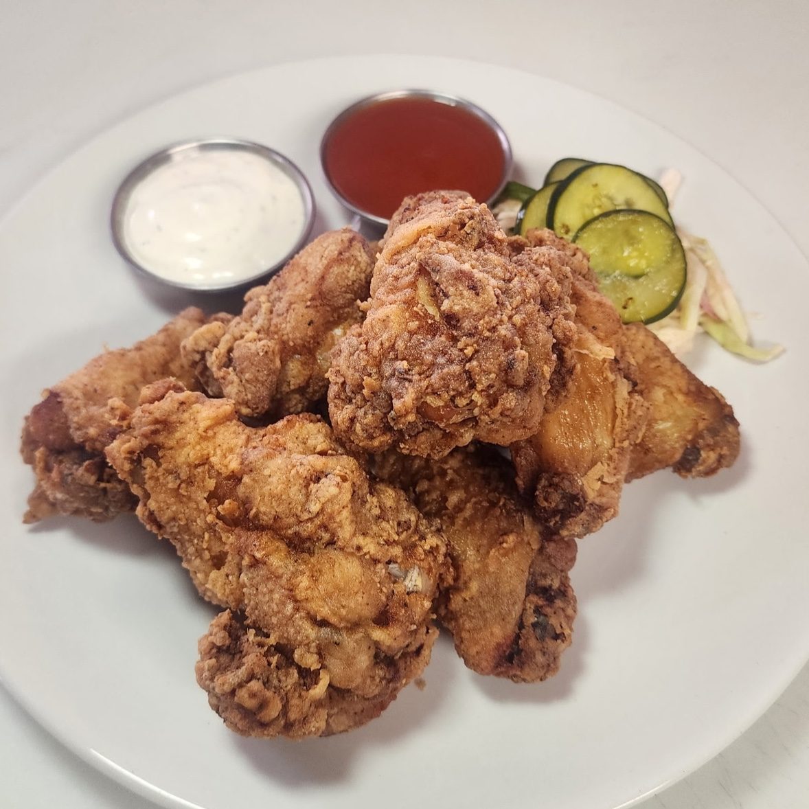 Chicken Wings (sauce always served on the side).